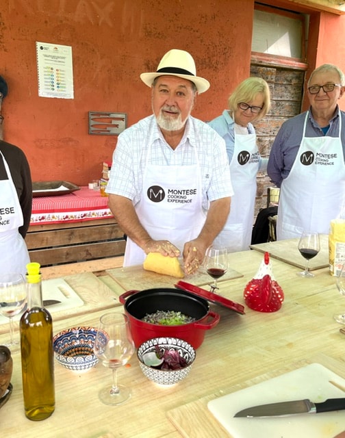 Chef demonstrating Italian cooking class San Gimignano