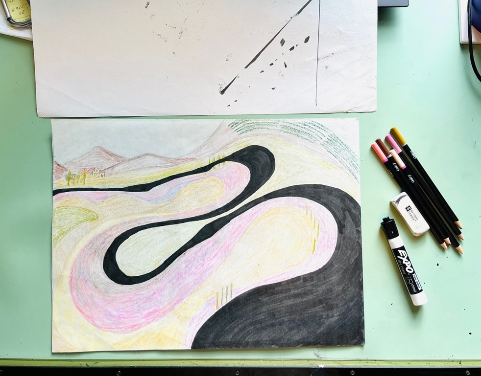 Road Trip sketch on desk with drawing supplies
