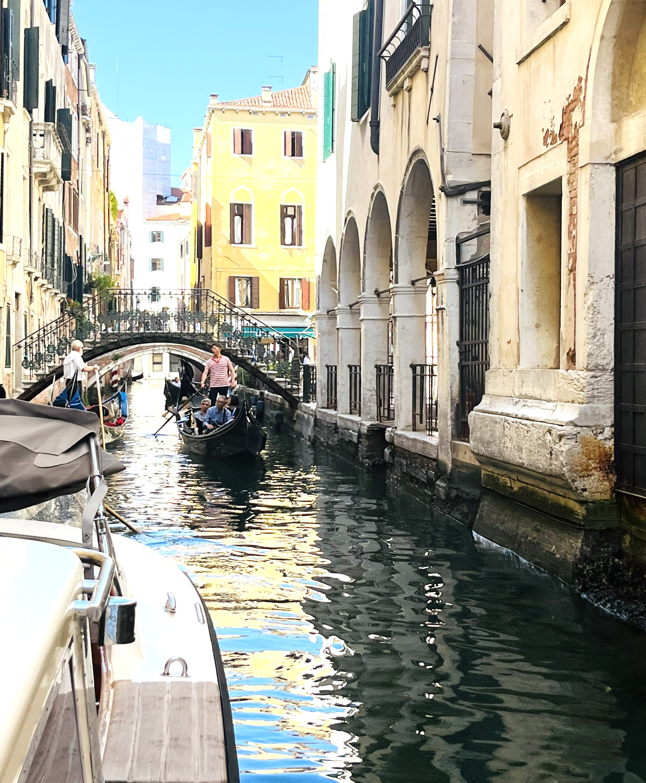 Gondola on Venice canal historic buildings