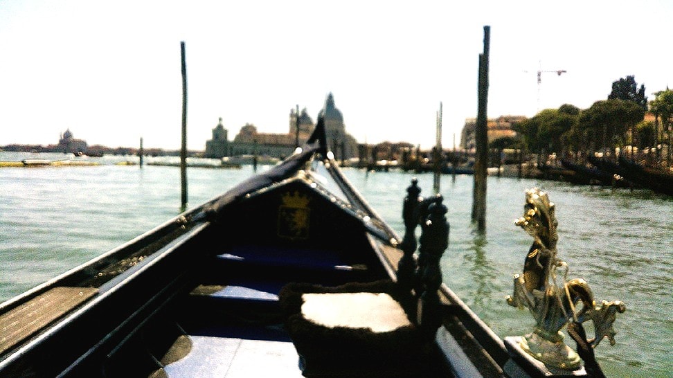 Gondola bow Venice canal waterfront